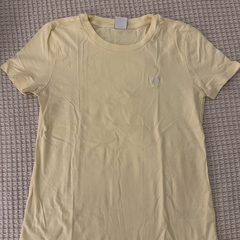 Aritzia TNA yellow baby tee